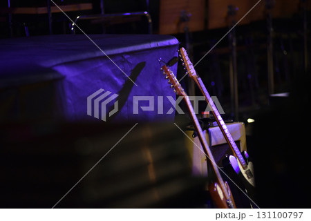 Electric guitars on the stage at live concert Electric guitars on the stage at live concert 131100797