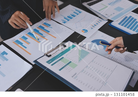 Team of business people working together in the meeting room office,teamwork background charts and graphs banner, double exposure successful teamwork,business planning concept. 131101458
