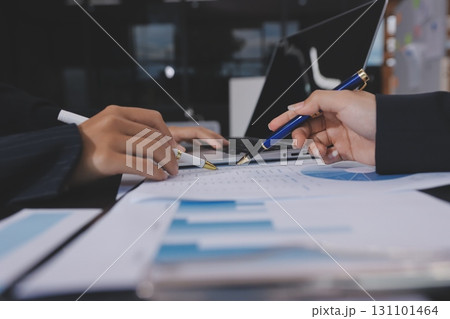 Team of business people working together in the meeting room office,teamwork background charts and graphs banner, double exposure successful teamwork,business planning concept. 131101464