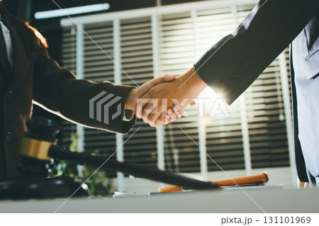 Lawyer explained to the client about the law that must be brought against the court case. 131101969