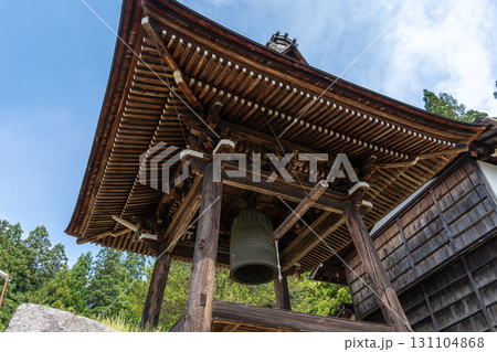 Bell tower of Soyuji Temple in Takayama, Japan under blue sky 131104868