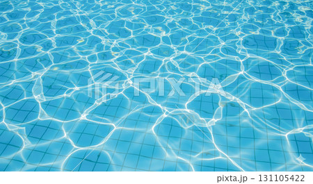 Swimming pool water background with sun reflections and caustic pattern, beautiful summer vacation concept for travel, resort and relaxation theme 131105422