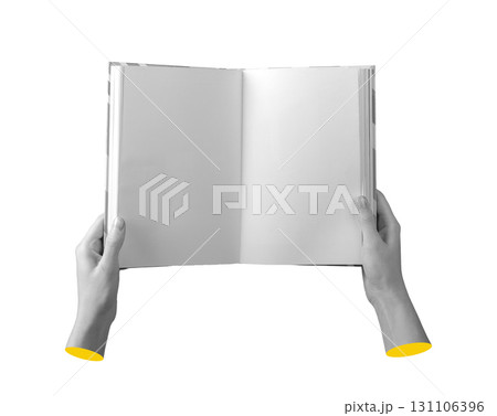 Book with blank pages held in hand. Open layout with clean empty sheet, clear surface and white 131106396