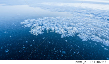 Macro Shot of Blue Snowflakes Crystals on Frozen Lake Water in Winter Season Cold Weather Texture Macro Shot of Blue Snowflakes Crystals on Frozen Lake Water in Winter Season Cold Weather Texture 131106943