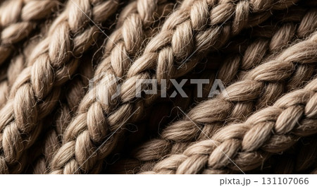 Detailed Macro Shot of Brown Braided Wool Texture with Sparkling Glitter 131107066