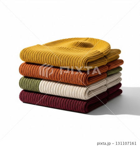 Stacked Knitted Beanies in Various Colors on White Background Plain Style Stacked Knitted Beanies in Various Colors on White Background Plain Style 131107161