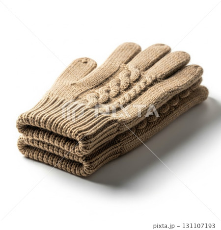 Folded Beige Knitted Gloves with Cable Knit Pattern on White Background Folded Beige Knitted Gloves with Cable Knit Pattern on White Background 131107193