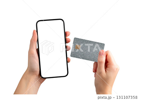 Mock up scene. Card and phone held by female user, electronic finance, online commerce, money Mock up scene. Card and phone held by female user, electronic finance, online commerce, money 131107358