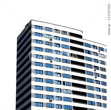 Tall residential building with striped facade and reflective blue windows. White and gray modern 131107402