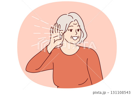 Elderly woman experiences deafness and puts hand to ear to hear interlocutor or neighbors 131108543