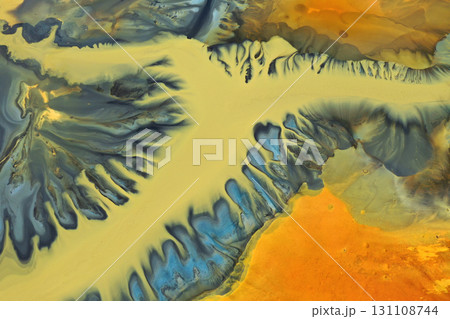 Aerial view of colorful contaminated cyanide residuals waters from gold mine. Abstract nature pattern Aerial view of colorful contaminated cyanide residuals waters from gold mine. Abstract nature pattern 131108744