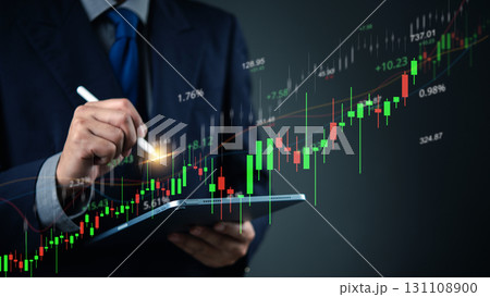 Close-up of hand using stylus on stock market chart on tablet. Ideal for stock trading, investment analysis, financial planning, and business growth concepts. 131108900