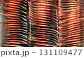 Abstract background of red and green tea bags in a large metallic wrapper, seen from above 131109477