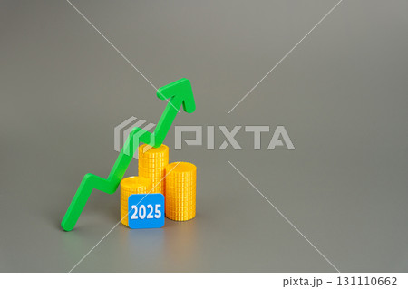 Coins, up arrow with 2025. Growth and development of business and economy. Strategy and vision. Targets and goals. Financial plan, performance, planning. Copy space. Place for text Coins, up arrow with 2025. Growth and development of business and economy. Strategy and vision. Targets and goals. Financial plan, performance, planning. Copy space. Place for text 131110662