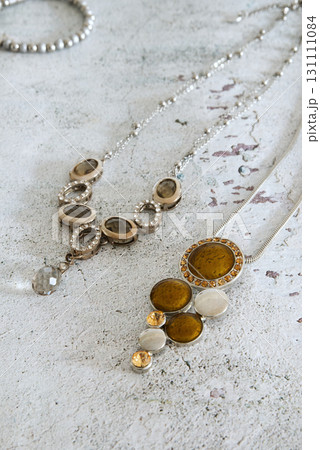 Antique jewelry, vintage necklaces on a rustic background 131111084