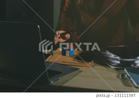 Customer signing a real estate contract in real estate agency. Customer signing a real estate contract in real estate agency. 131111397