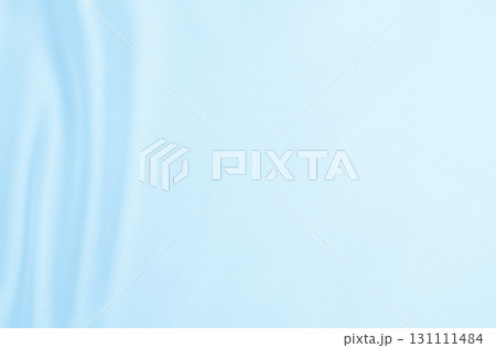 Smooth elegant blue silk or satin luxury cloth texture as abstract background. Luxurious background design Smooth elegant blue silk or satin luxury cloth texture as abstract background. Luxurious background design 131111484
