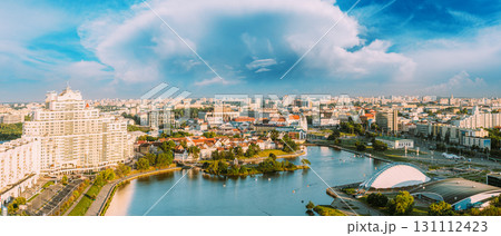 Minsk, Belarus. Elevated View Of Historical Center, Old Town. Minsk Skyline In Sunny Summer Evening. Holy Spirit Cathedral In Nemiga District In Sunset. Aerial View Of Belarusian Capital. Panorama Minsk, Belarus. Elevated View Of Historical Center, Old Town. Minsk Skyline In Sunny Summer Evening. Holy Spirit Cathedral In Nemiga District In Sunset. Aerial View Of Belarusian Capital. Panorama 131112423