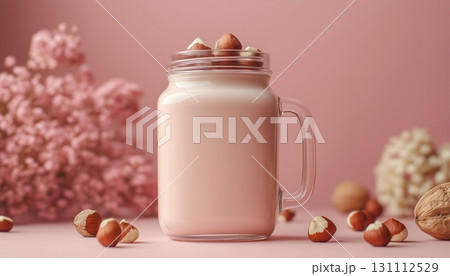 Hazelnut milk on glass jar for healthy drink on daily routine 131112529