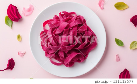 Gluten free beets pasta flour for red color healthy food on white plate 131112577