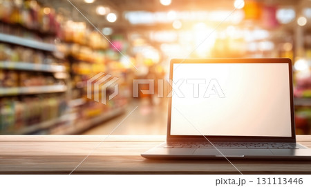 Vibrant Laptop on Table with Blurred Grocery Store Background 131113446