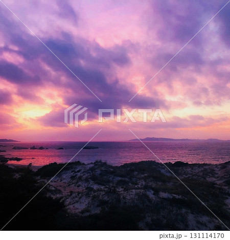 Dramatic Sunset over Rocky Coast 131114170