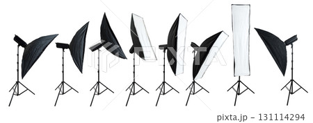 Collection set of professional studio lighting equipment with a softbox on a tripod isolated over a white background Collection set of professional studio lighting equipment with a softbox on a tripod isolated over a white background 131114294