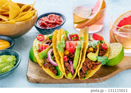 Tacos with meat and vegetables, with Paloma cocktails and nachos 131115021