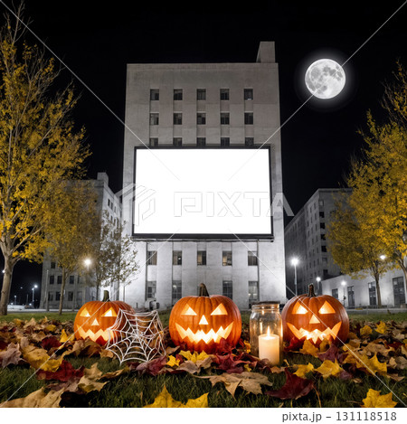 mockup of a halloween billboard on a city street at night with pumpkin lanterns and autumn leaves. mockup of a halloween billboard on a city street at night with pumpkin lanterns and autumn leaves. 131118518
