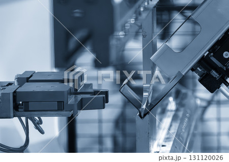 High technology bending machine operation with robotic system in the light blue scene. High technology bending machine operation with robotic system in the light blue scene. 131120026
