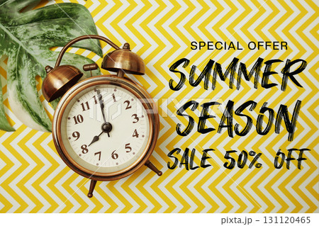 Summer Sale 50% Off text with alarm clock and monstera leaf on yellow background Summer Sale 50% Off text with alarm clock and monstera leaf on yellow background 131120465