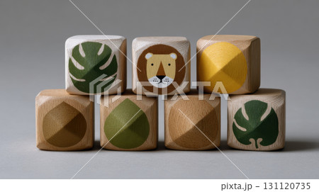 Wooden blocks with lion and leaf designs are perfect for Kwanzaa for children, promoting creativity and cultural learning 131120735