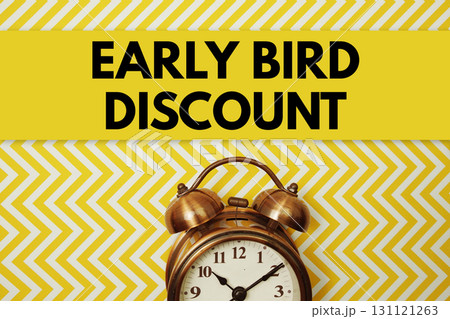 Early Bird Discount text with alarm clock on yellow background Early Bird Discount text with alarm clock on yellow background 131121263