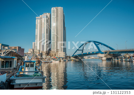 Sokcho harbor with fishing boats and modern skyscrapers, South Korea 131122353