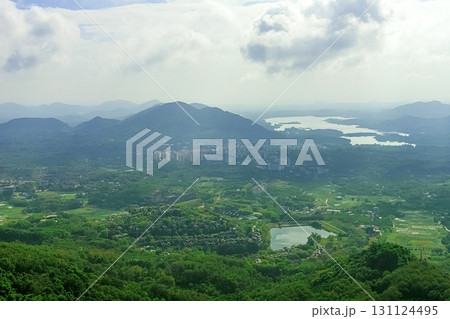 View of the beautiful jungle depths of Yanoda Park on Hainan Island, China. 131124495