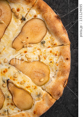 Gourmet pear and cheese pizza with crispy crust Gourmet pear and cheese pizza with crispy crust 131124695