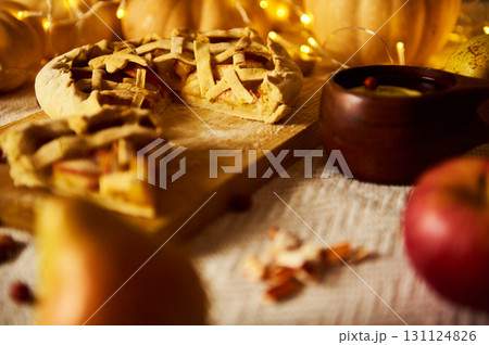 Warm Apple Pie With Lattice Crust On Wooden Board For Thanksgiving Table 131124826