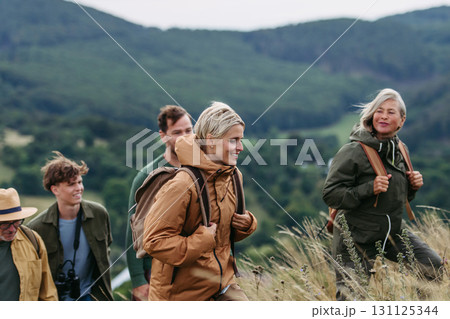 Multigenerational family on hiking trip in nature. 131125344