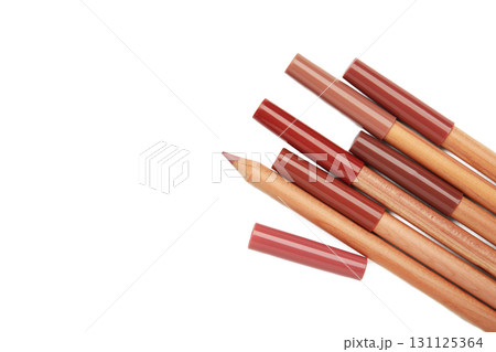 Different lip pencils isolated on white background. Cosmetic product 131125364