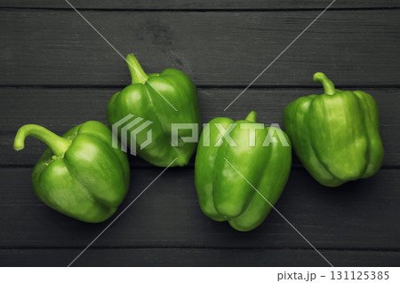 Macro Photo food vegetable green bell peppers on black background. Macro Photo food vegetable green bell peppers on black background. 131125385