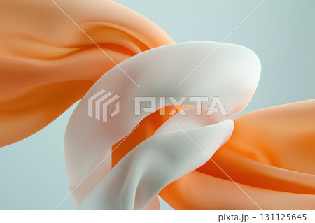 Soft flowing fabric in orange and white colors creates serene and elegant composition. gentle curves and textures evoke sense of calm and fluidity 131125645