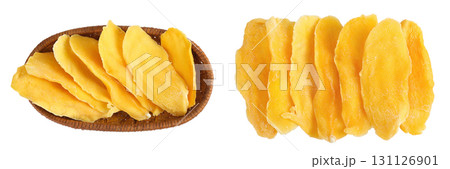dried mango in a wicker basket isolated on white background. Top view. Flat lay. 131126901