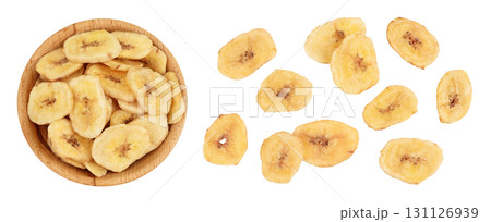 Dried banana chips in wooden bowl isolated on white background with full depth of field. Top view. Flat lay Dried banana chips in wooden bowl isolated on white background with full depth of field. Top view. Flat lay 131126939