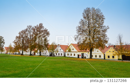 Medieval houses, farms, and granaries of Holasovice village in South Bohemia, arranged around a park with ponds. A UNESCO World Heritage Site showcasing rural baroque architecture 131127266