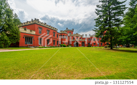 Romantic castle with red facade. Hradek u Nechanic. Czech Republic. Nechanice. Panoramic exterior view. 131127554