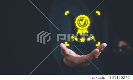 Businessperson holding and showing the best quality assurance with five stars. Quality assurance of business services. Guarantee, warranty, standard, ISO certification and testimonial concept. 131130276