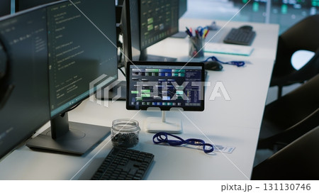 Devices in data center employing machine learning technology to maintain company network infrastructure. Advanced tech used in server hub to ensure optimal system performance, handheld camera shot 131130746