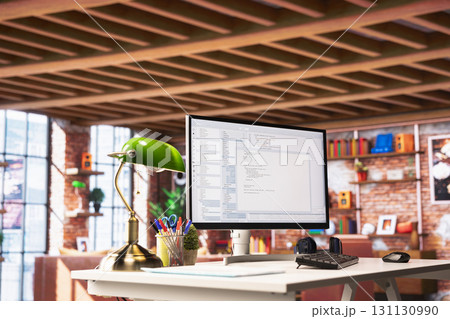 UI on PC screen in home office with programming code being executed. Coding application on computer display used by IT programmer to write and test code in modern apartment UI on PC screen in home office with programming code being executed. Coding application on computer display used by IT programmer to write and test code in modern apartment 131130990