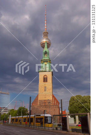 St Marys Church and Berlin TV Tower in Berlin Germany at sunset 131131125