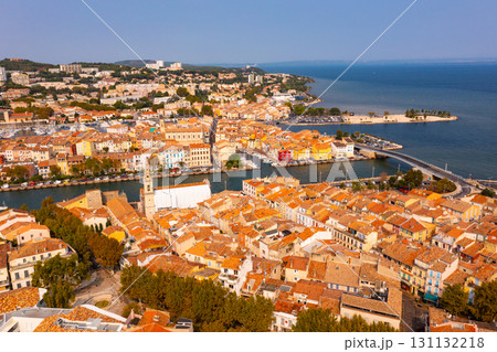 Aerial view of the administrative center with residential areas of the seaside town of Martigues 131132218